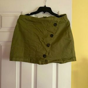 Skirt size L. Sage green with brown button design.